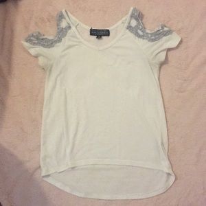 Top with shoulder cutouts